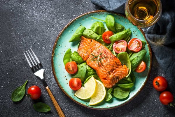 Low Carb High Fat Diet: Image of baked-salmon-fish-fillet-with-fresh-salad-top